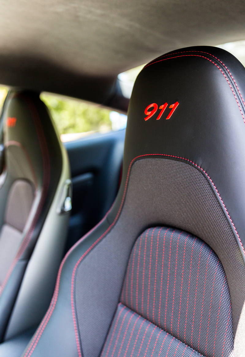 They’re cloth. So what? They’re perfectly grippy, and the standard seats are reasonably lightweight.